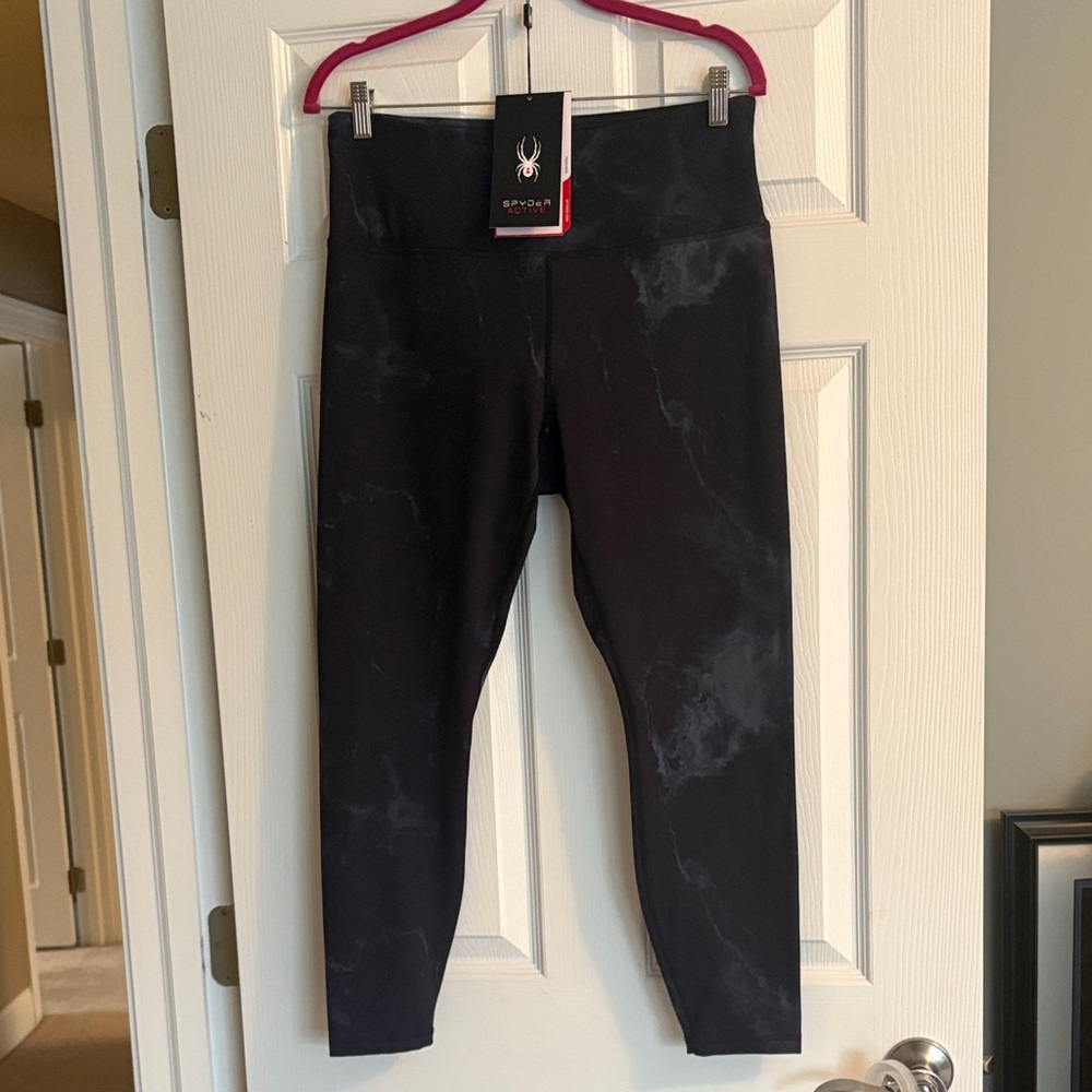 Spyder Active leggings- Large- high waisted 
NWT- black w deep blue pattern